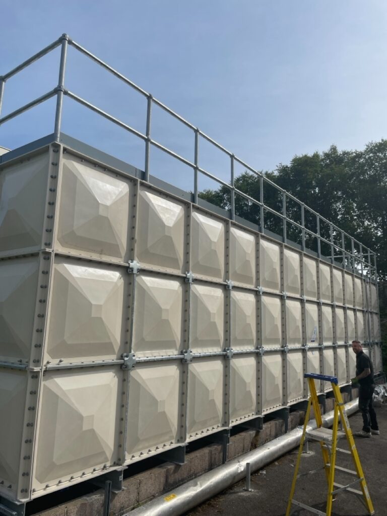 sectional water tank installation with correct base