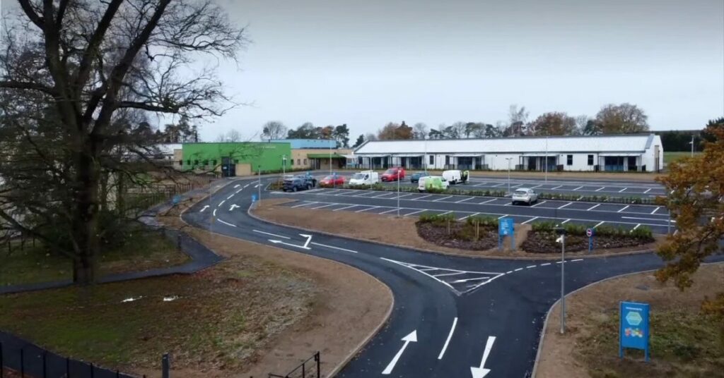 LPCB approved GRP sprinkler tank installation at SEN School in Falkenham by Tricel Water ensuring BE EN 12845 and BS 9251 compliance