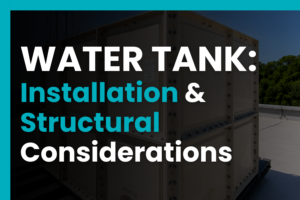 GRP sectional water storage tank installed on a concrete base with pipework, showing structural and installation considerations for water tanks.